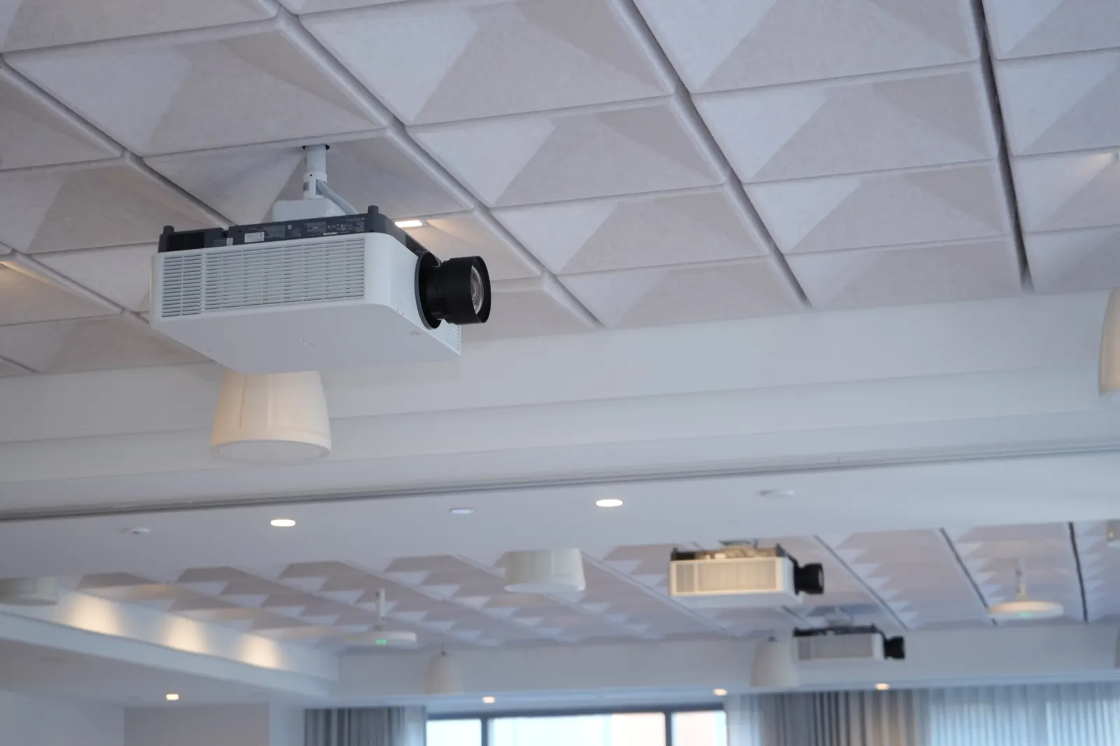Ceiling-mounted projectors
